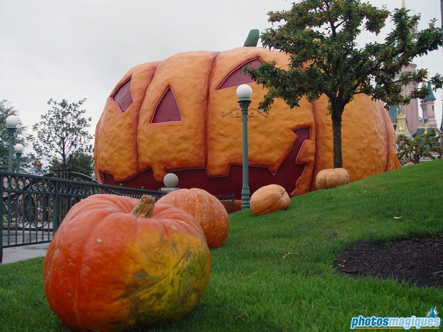 This joly team of Pumpkin Men painters sneak their way out Halloween Land, rolling a humongous pumpkin onto Central Plaza.